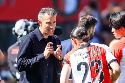 rotterdam 11 05 2025 stadium de kuip dutch eredivisie football season 2024 2025 feyenoord psv feyenoord trainer robin van persie feyenoord player anis hadj moussa