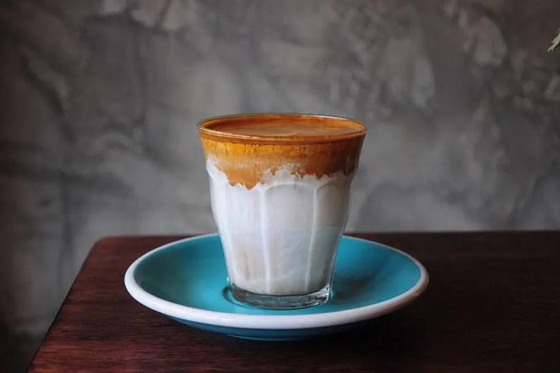 a-cup-of-dirty-coffee-on-a-saucer_Chananthorn-Angkapichit_Shutterstock