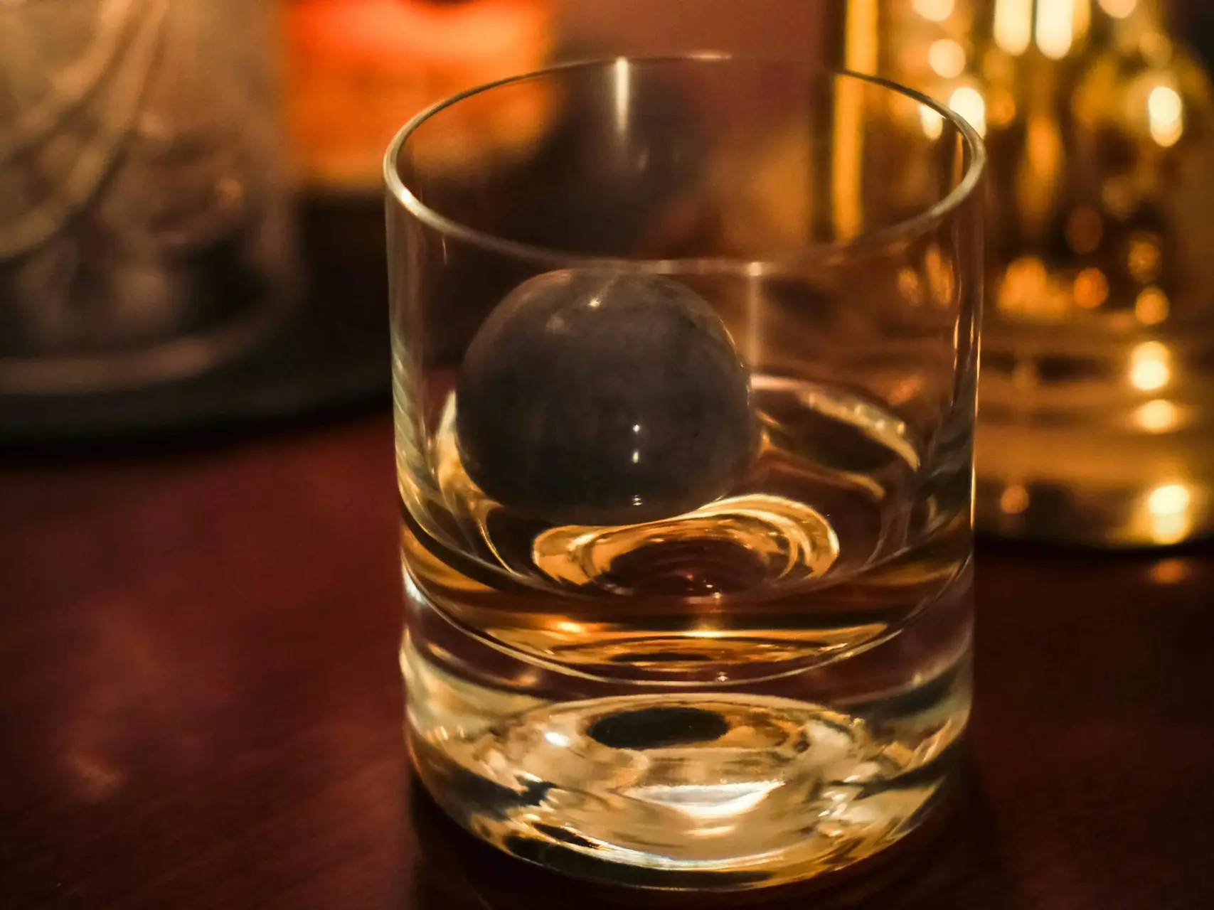 Whisky Tumbler Glass with ice ball in it