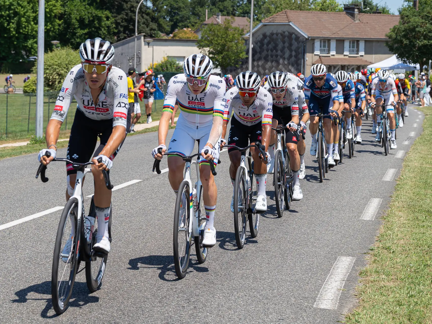 Tadej_Pogacar_in_the_peloton_of_Tour_de_France_2025_stage_12