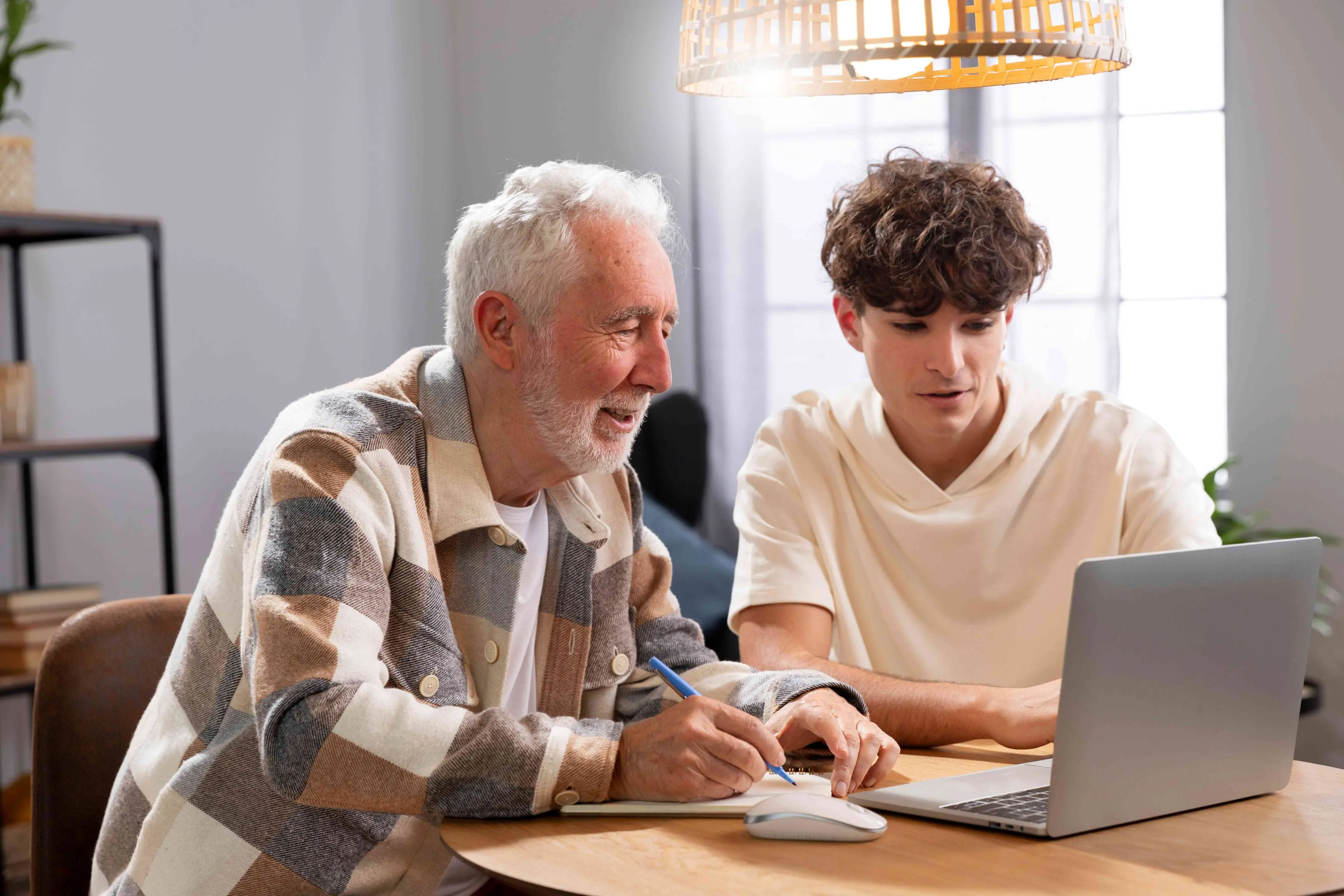 medium-shot-man-grandchild-with-laptop