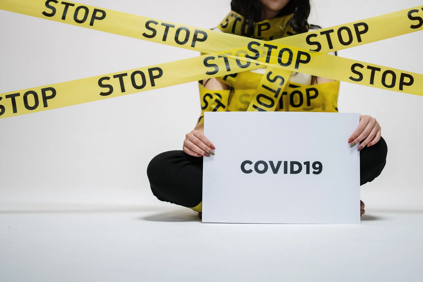 canva woman holding sign 1