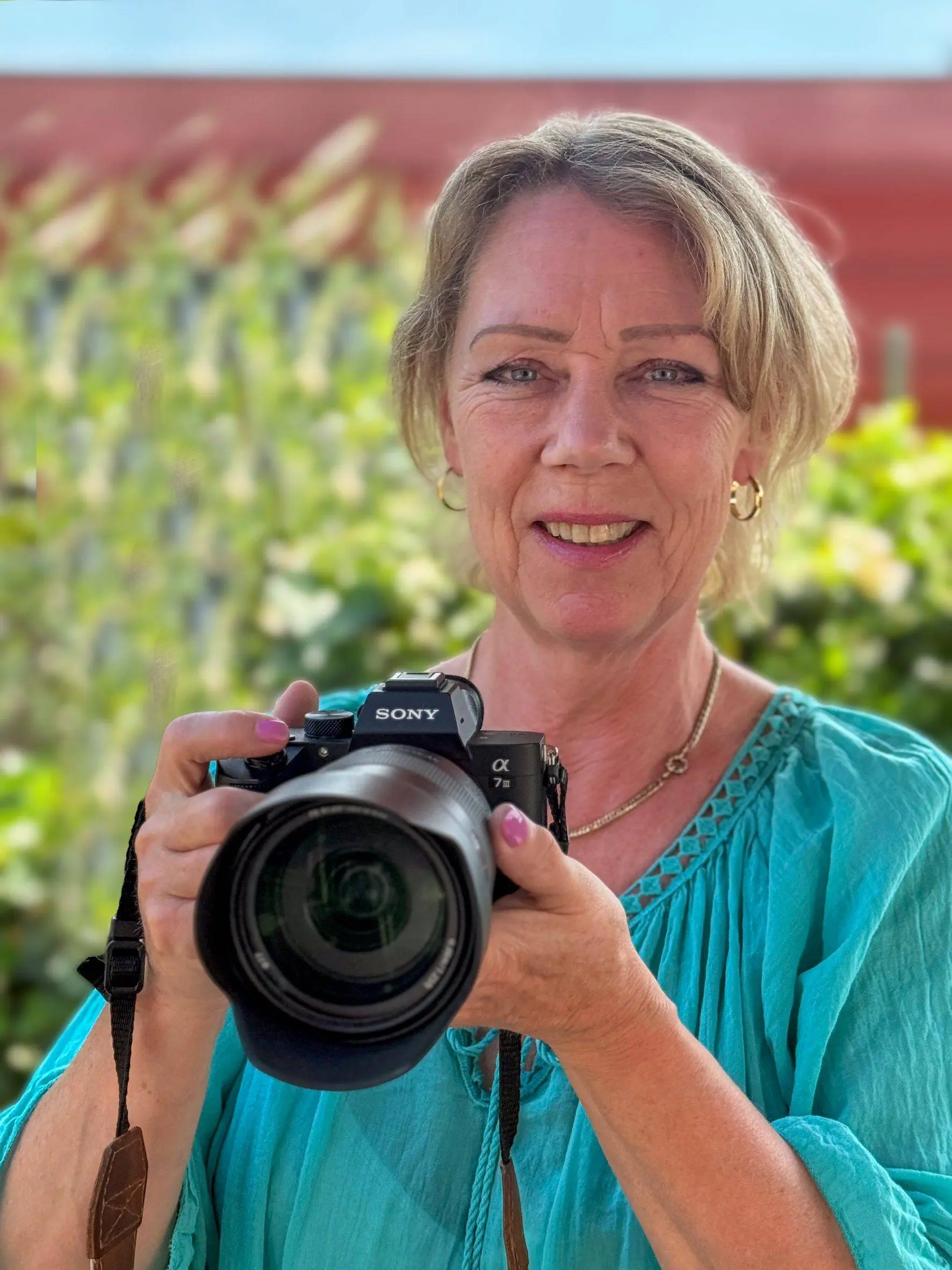 Fotografe Ingeborg Bech met camera