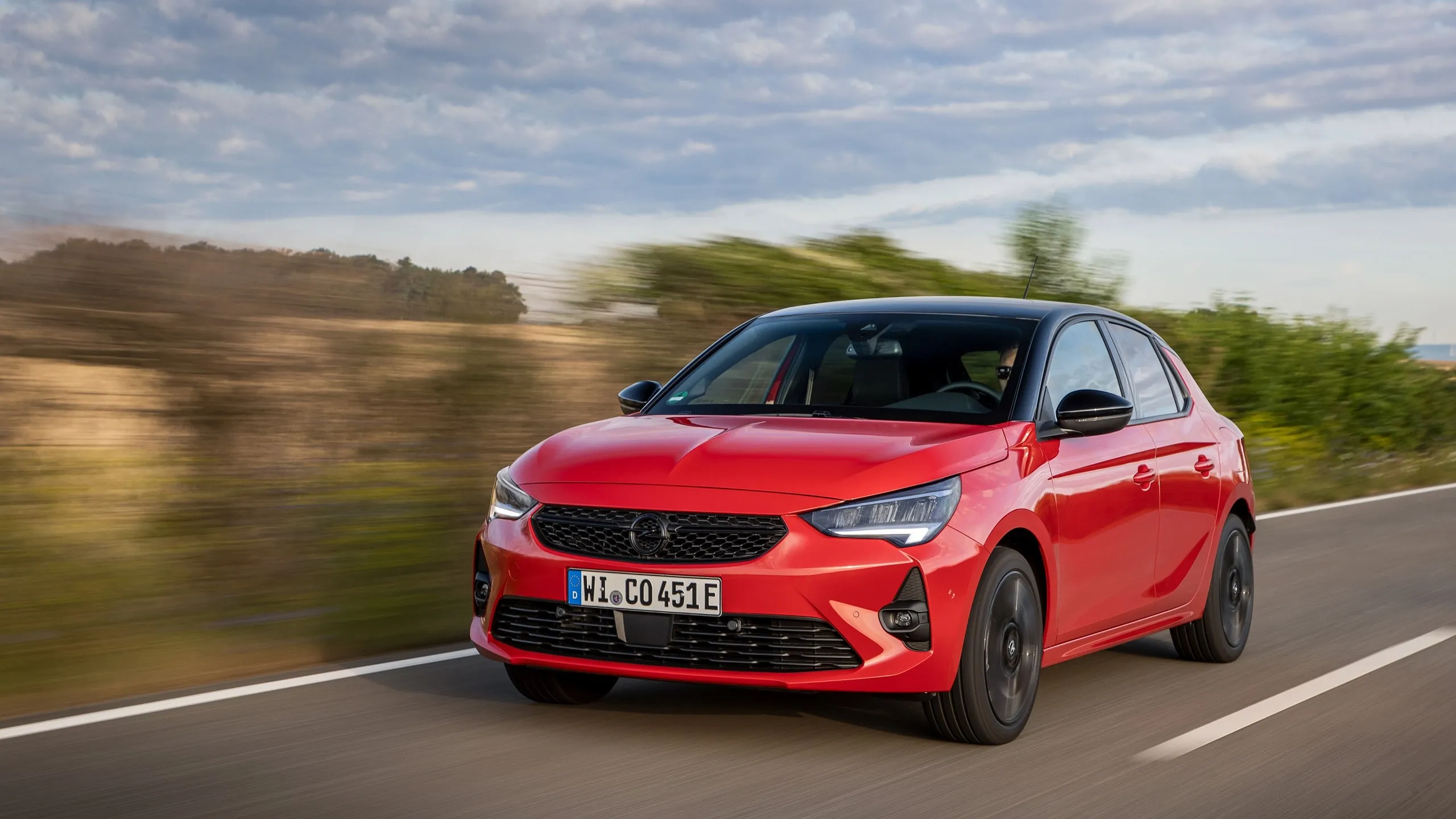 opel corsa 40 years rossa guida