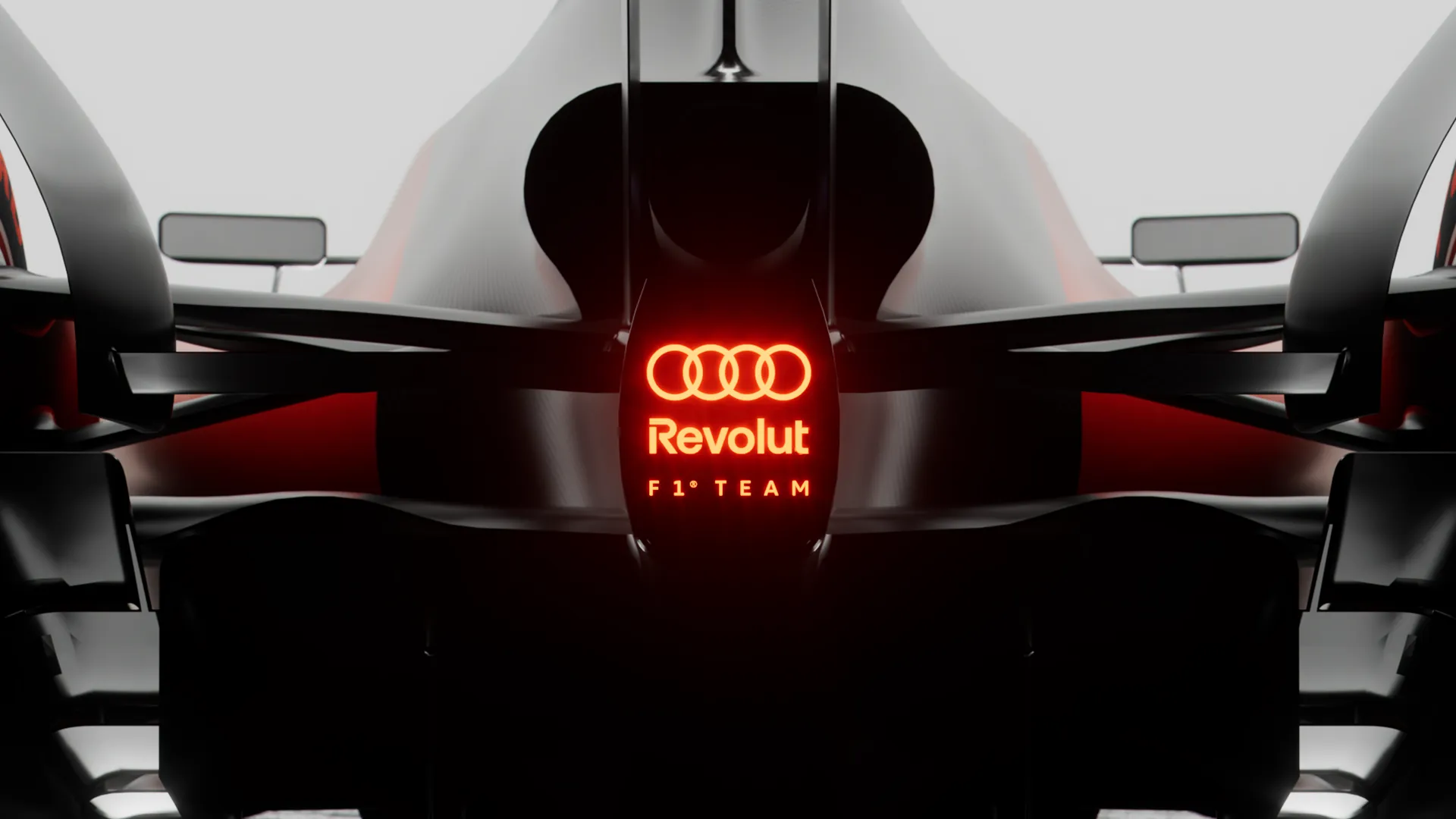 parte posteriore di una formula 1 di audi 2026 con scritta revolut e logo quattro anelli
