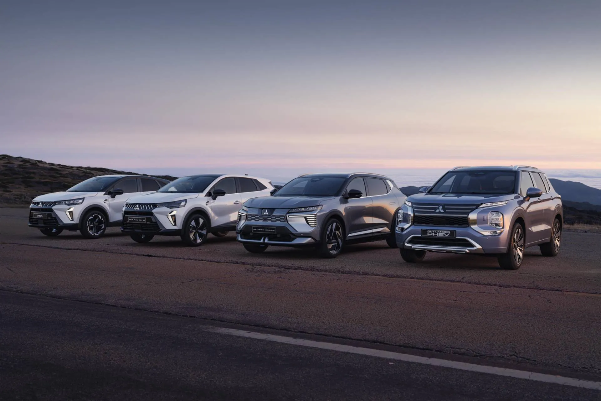Da sinistra a destra la Mitsubishi ASX, la Grandis, la Eclipse Cross e l'Outlander