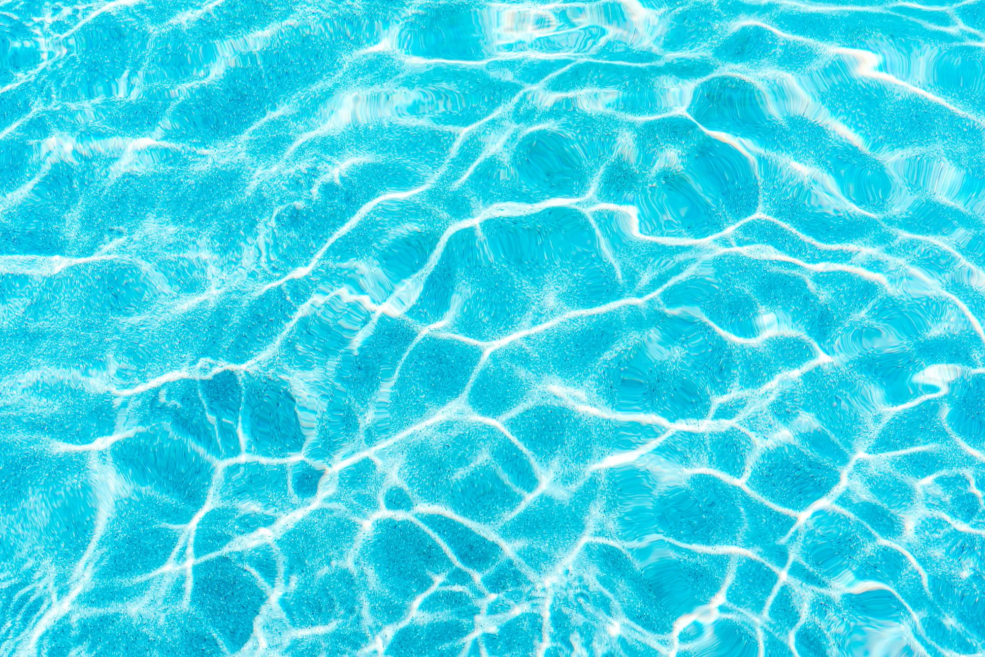 abstract pool water surface and background with sun light reflection