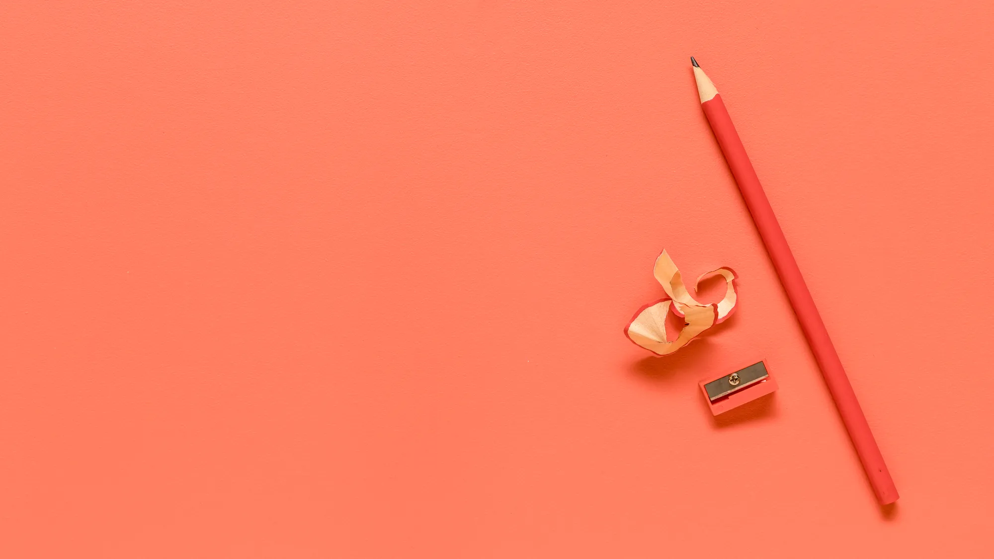 red office supplies colored surface