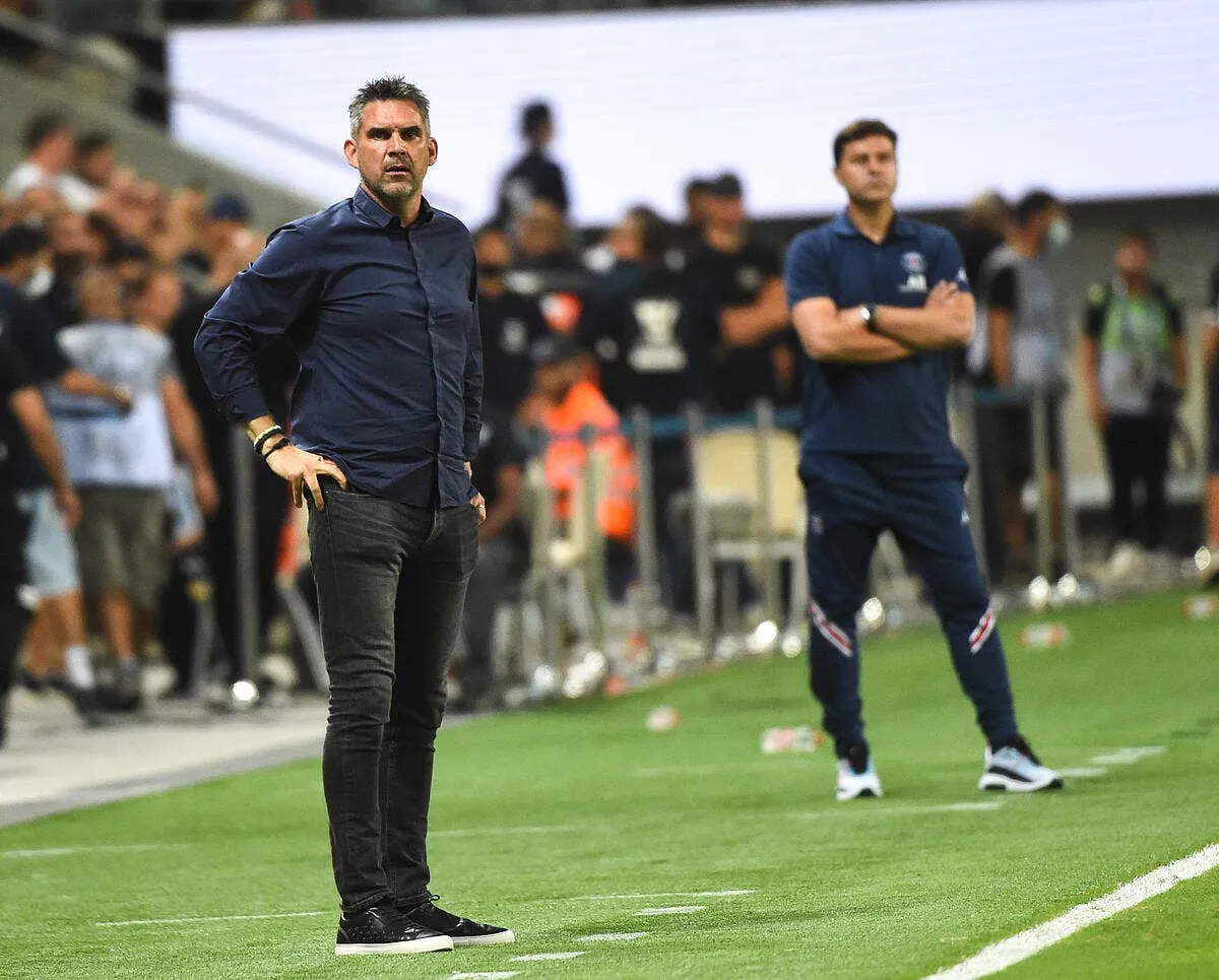 losc obraniak attend la ferrari de gourvennec au 1er virage icon ber 7762 320501