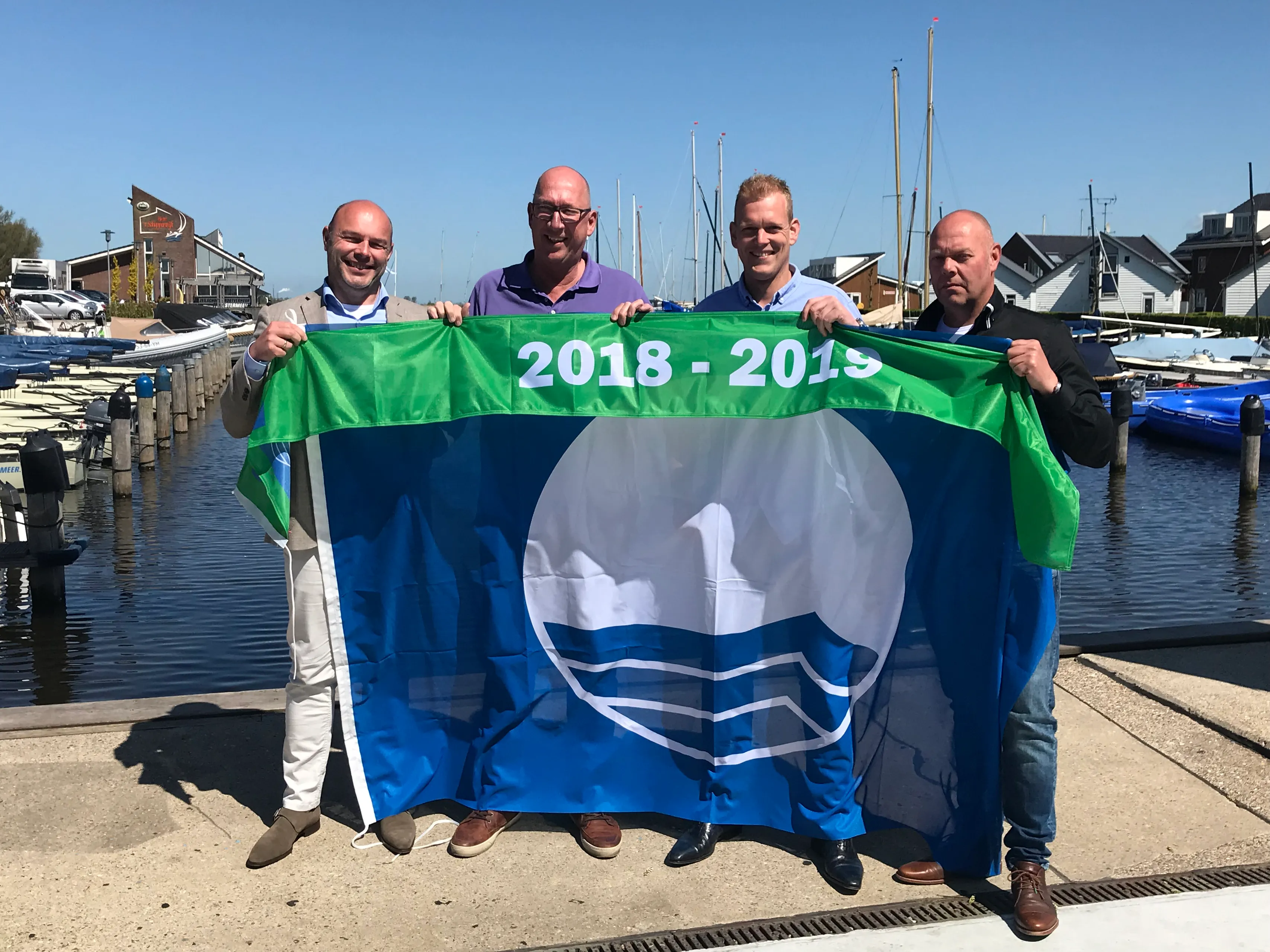 blauwe vlag uitreiking