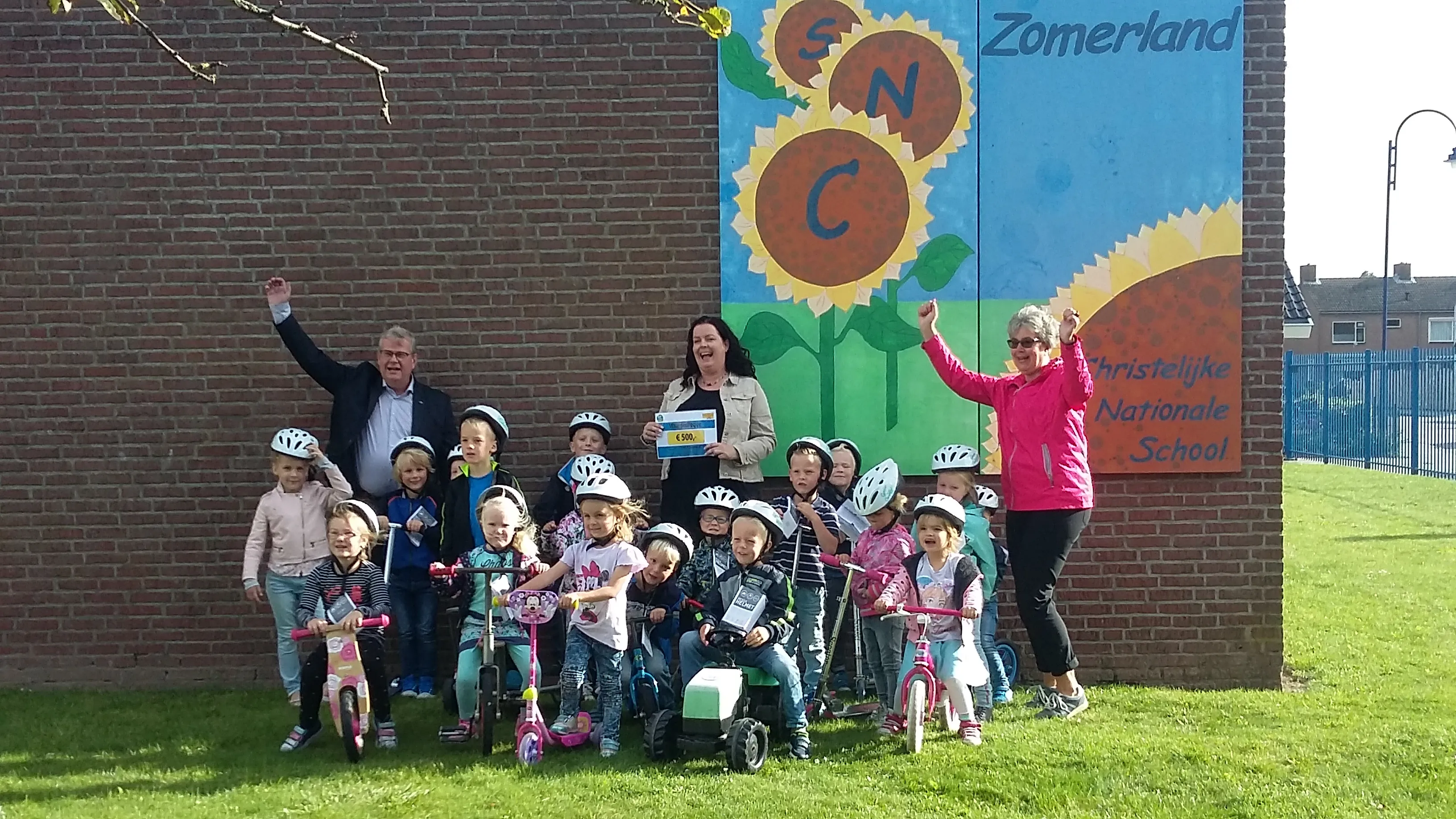 uitreiking cheque cycling4school