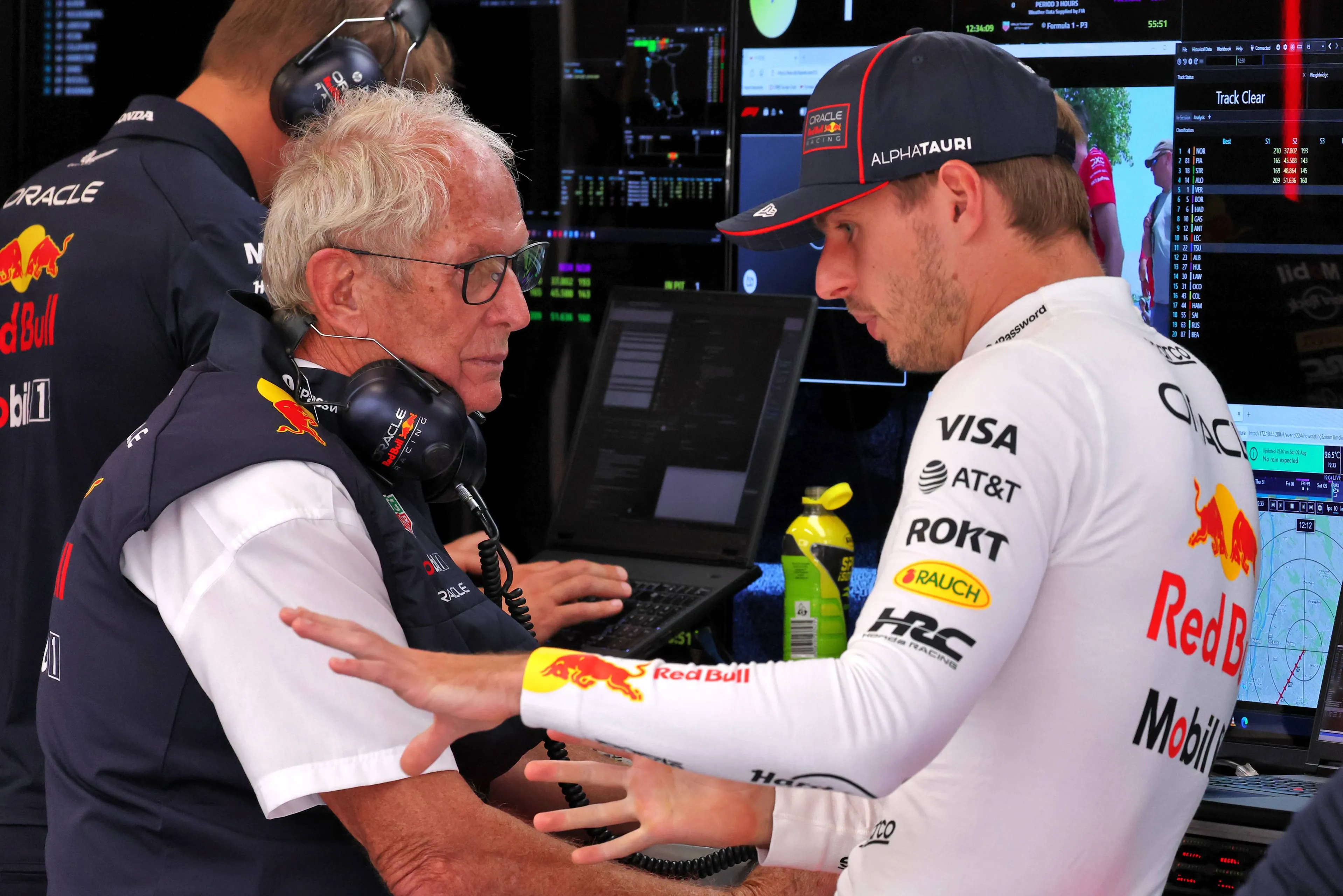 Helmut Marko and Max Verstappen in the Red Bull garage Photo RacePictures