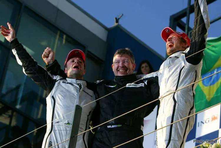 2009 179404 rubens barrichello ross brawn jenson button on the podium albert park melbourn1