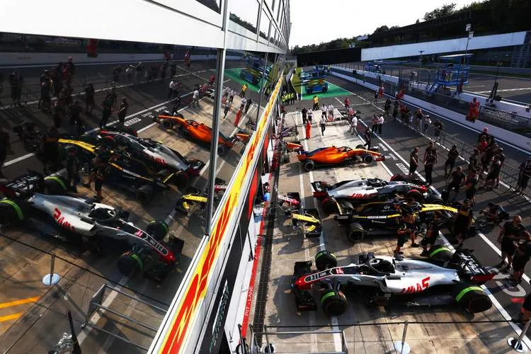 cars on pit lane at monza 523