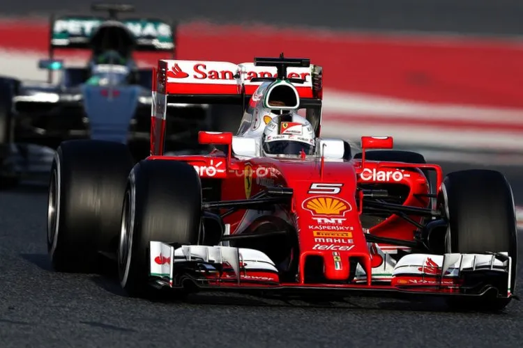 f1testingbarcelonadaytwoej7ftc80ctyxmercedesferrarivettel 1