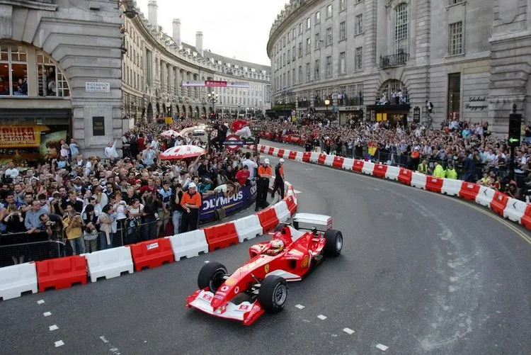 italys badoer takes part in a parade of formula one cars in regent street london 1