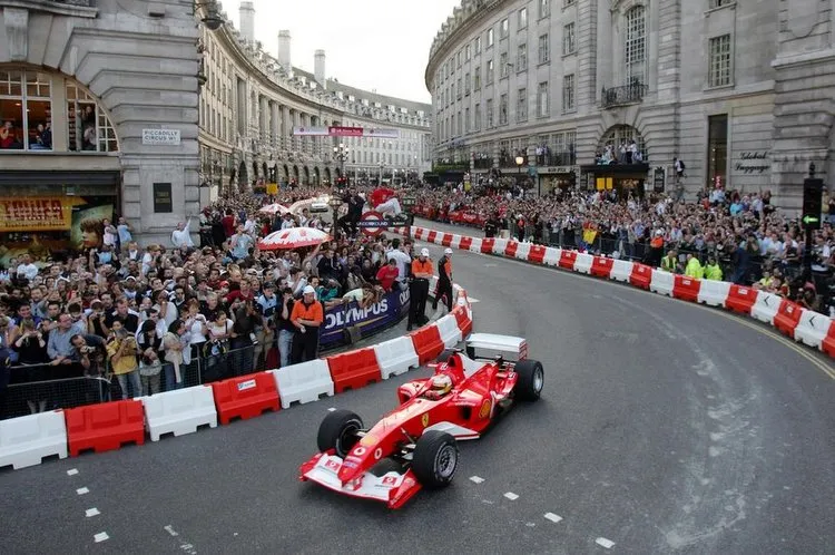 italys badoer takes part in a parade of formula one cars in regent street london