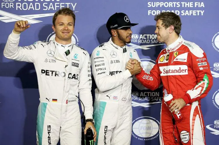 lewis hamilton of great britain and mercedes gp nico rosberg of germany and mercedes gp and sebastian vettel of germany and ferrari2 2