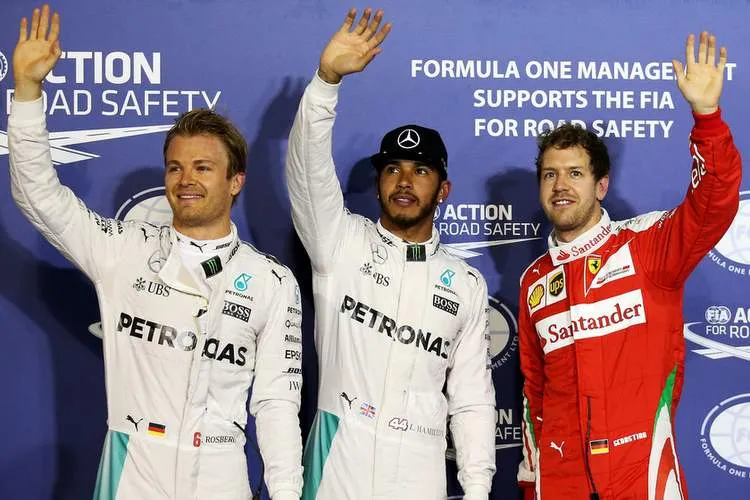 lewis hamilton of great britain and mercedes gp nico rosberg of germany and mercedes gp and sebastian vettel of germany and ferrari4