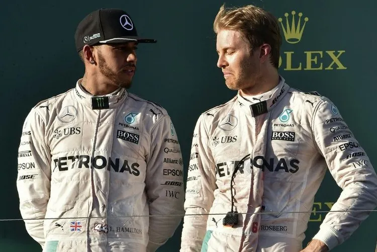 mercedes amg petronas f1 teams german driver nico rosberg r talks to his teammate british driver lewis hamilton3 001