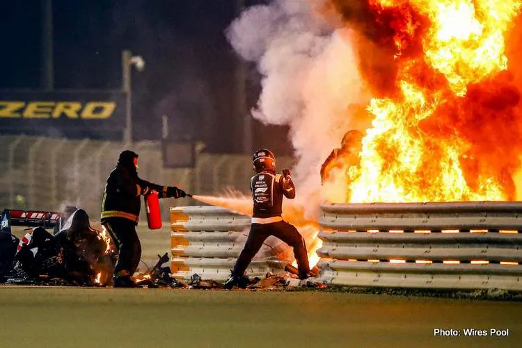 romain grosjean getting out of his car that is on fire at bahrain gp 2020