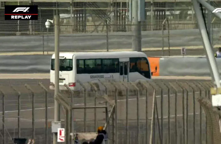 shuttle bus during f1 testing on track