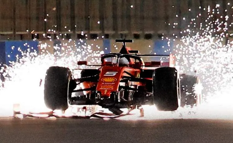 vettel crash screengrab sparks fly f1 ferrari bahrain photo