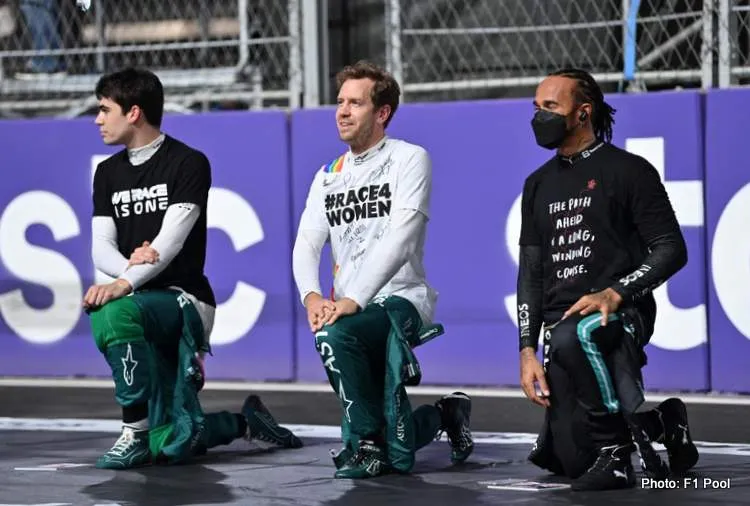 vettel hamilton stroll tyaking a knee f1