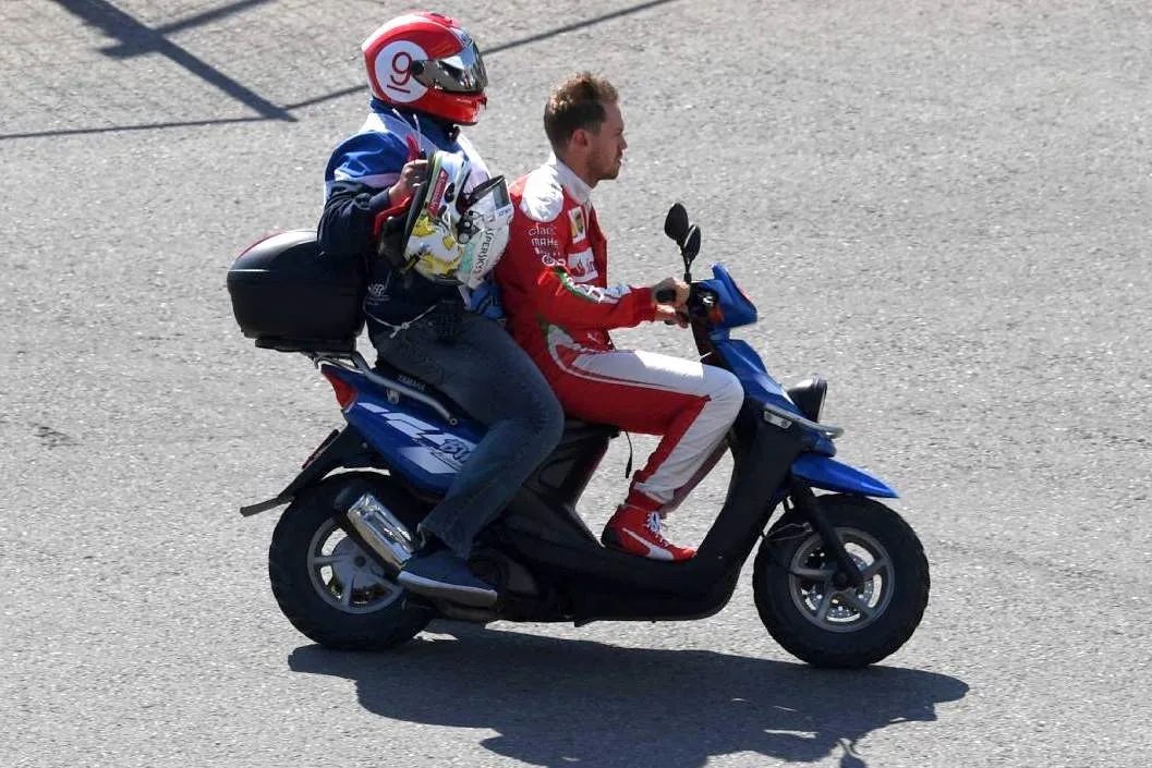 vettel kvyat crash scooter