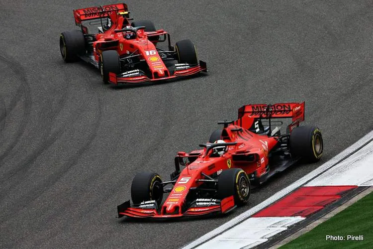 vettel passes leclerc