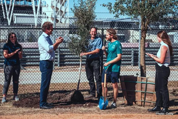 vettel planting trees at cota