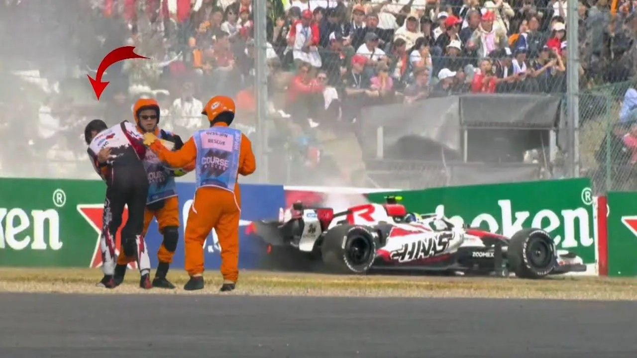 bearman helped by marshals suzuka crash