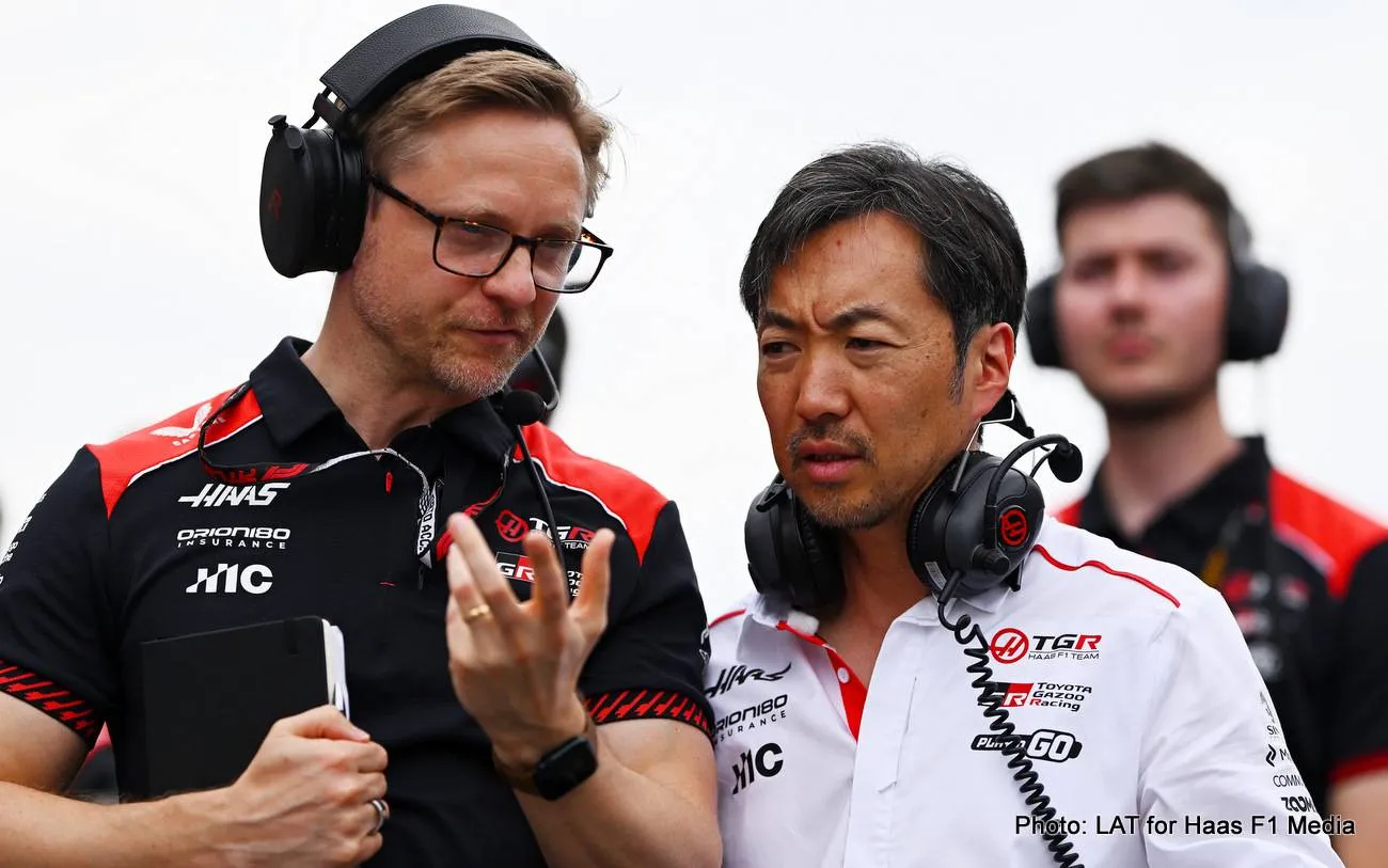 MIAMI, FLORIDA - MAY 03: Ayao Komatsu, Team Principal of Haas F1 talks with a teammate on the grid during the F1 Grand Prix of Miami at Miami International Autodrome on May 03, 2026 in Miami, Florida. (Photo by Guido De Bortoli/LAT Images)