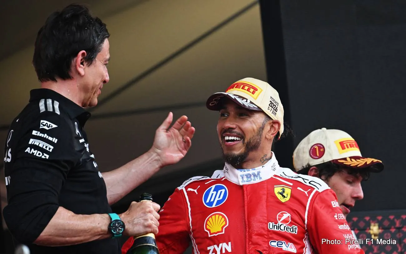 Toto Wolff, Executive Director of Mercedes AMG Petronas F1 Team and Second placed Lewis Hamilton of Great Britain and Scuderia Ferrari celebrate on the podium during the F1 Gra