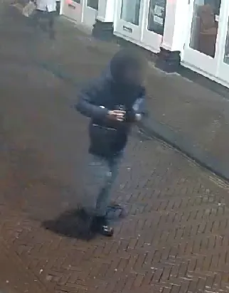 geblurde foto verdachte