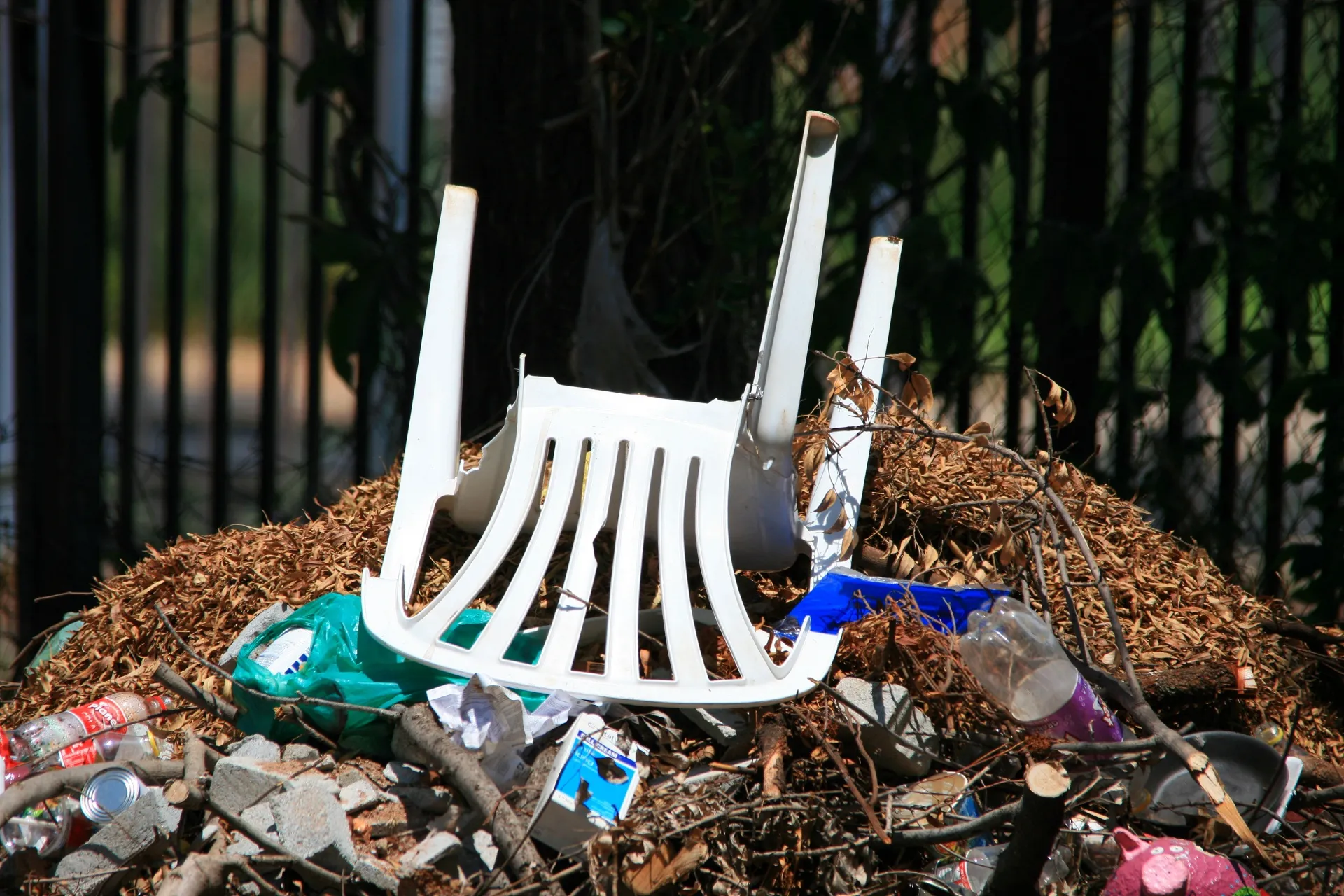 chair on rubbish heap