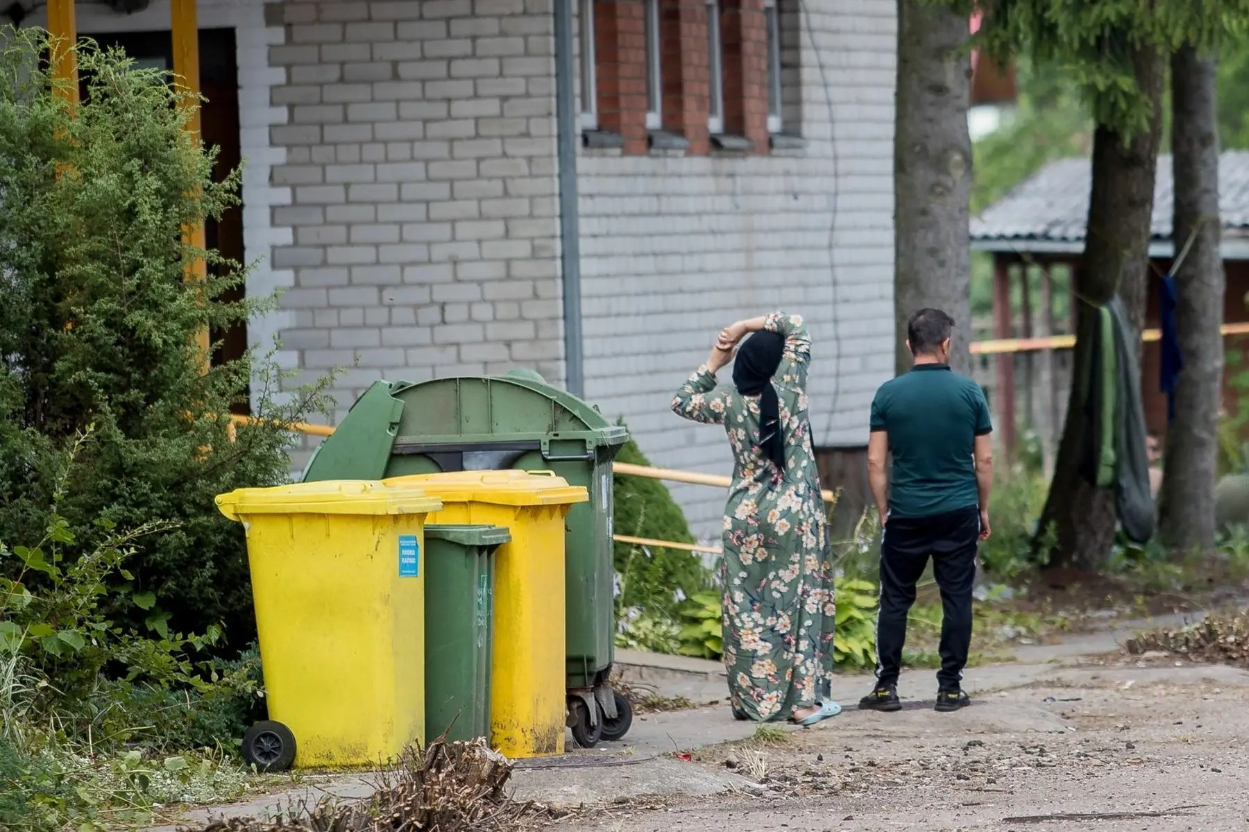 neteiseti migrantai kapciamiestyje buvusiu globos namu pastate 87738211
