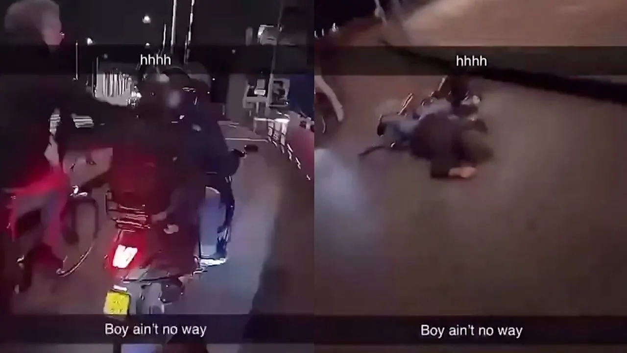 man van scooter getrokken
