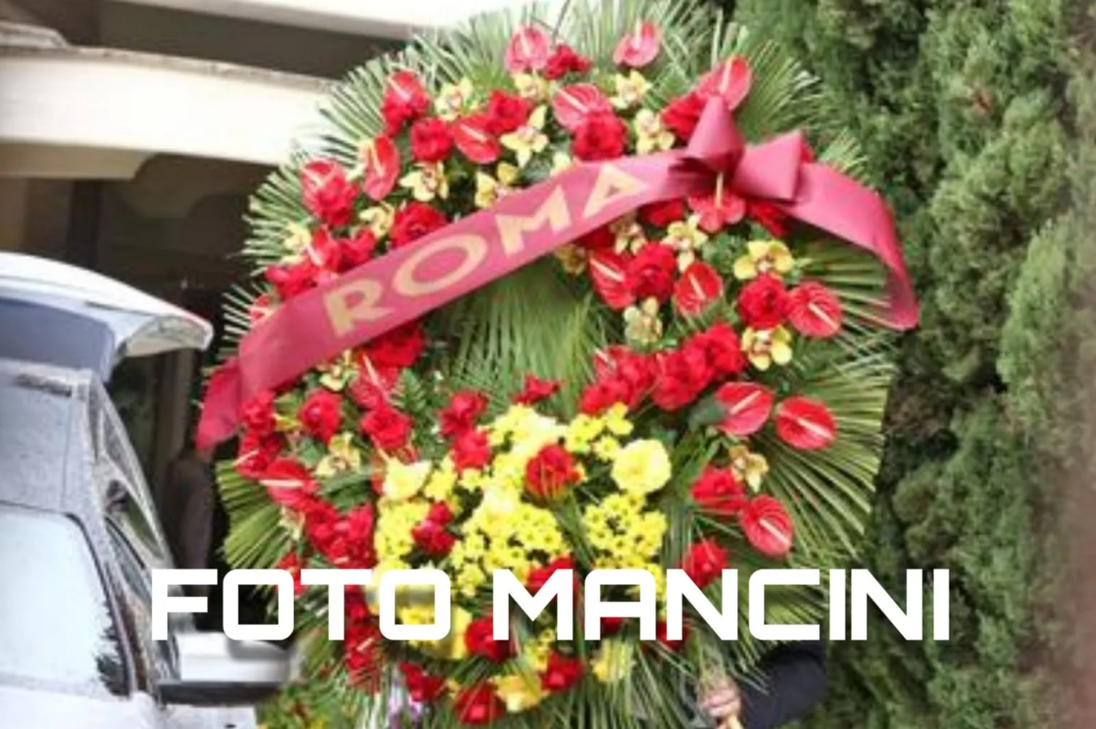 corona funerali enzo totti