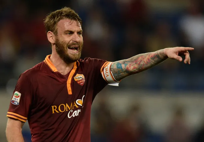 de rossi indica mezza figura 2014