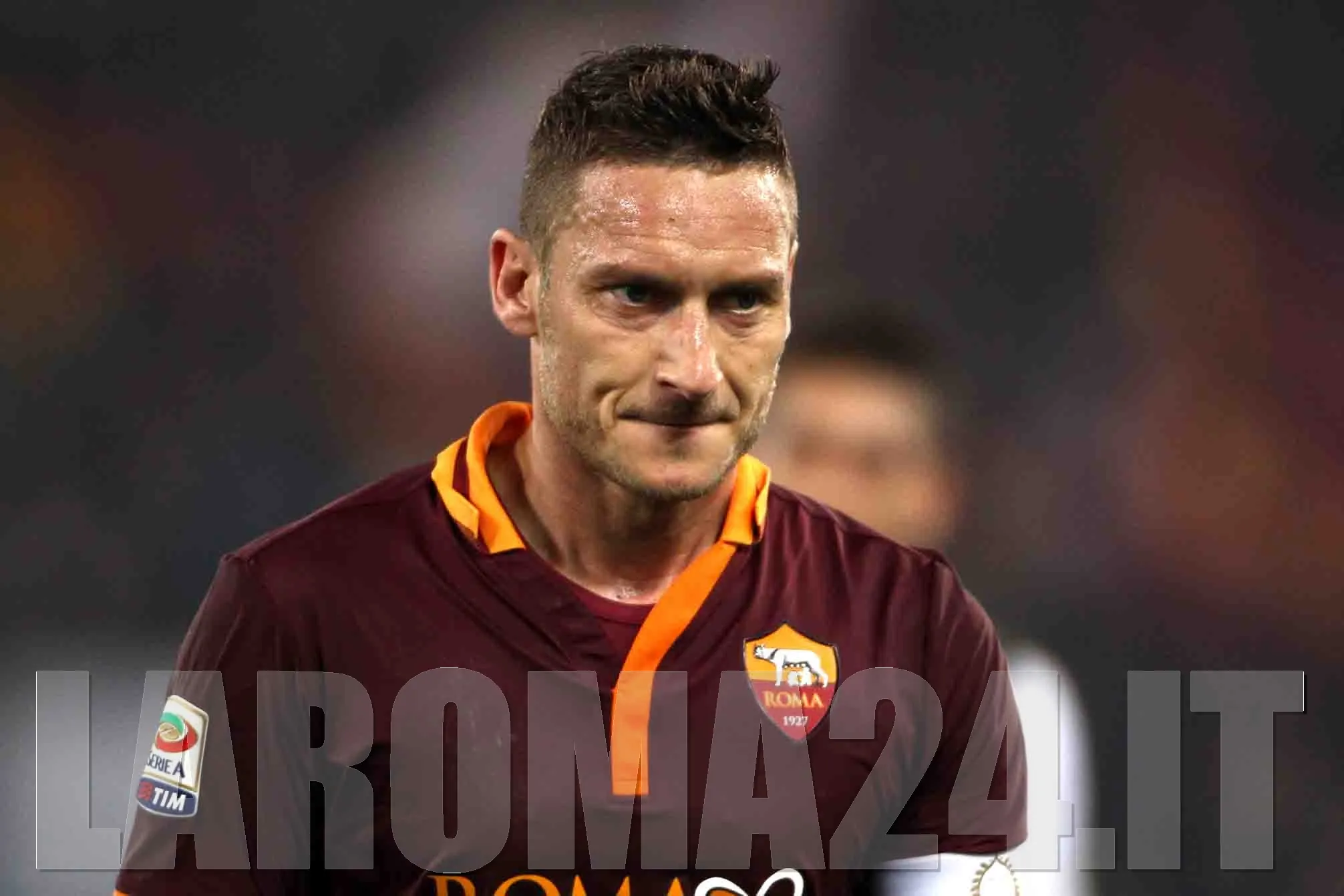 totti primo piano gino