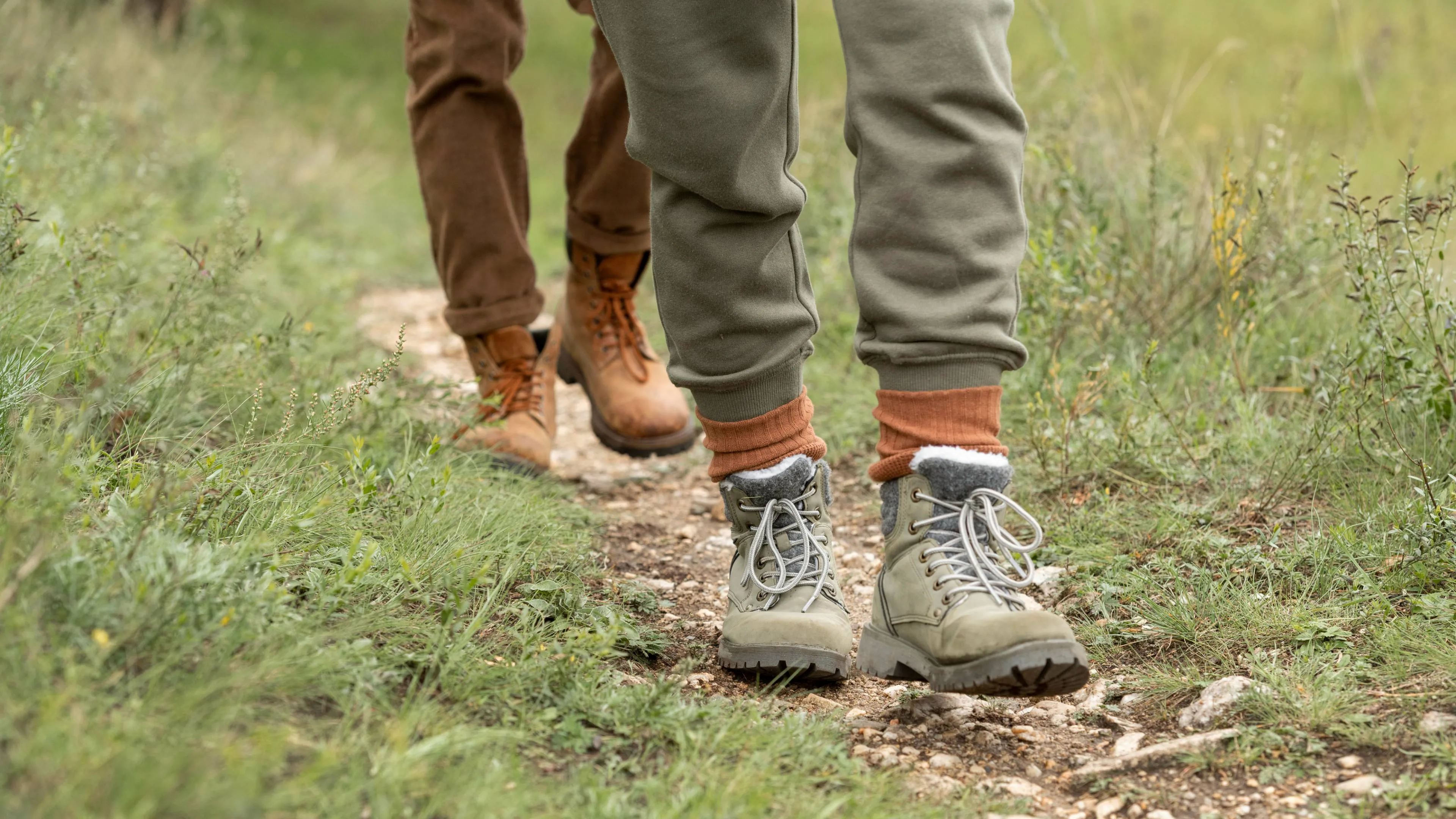 couple-s-feet-standing-trail