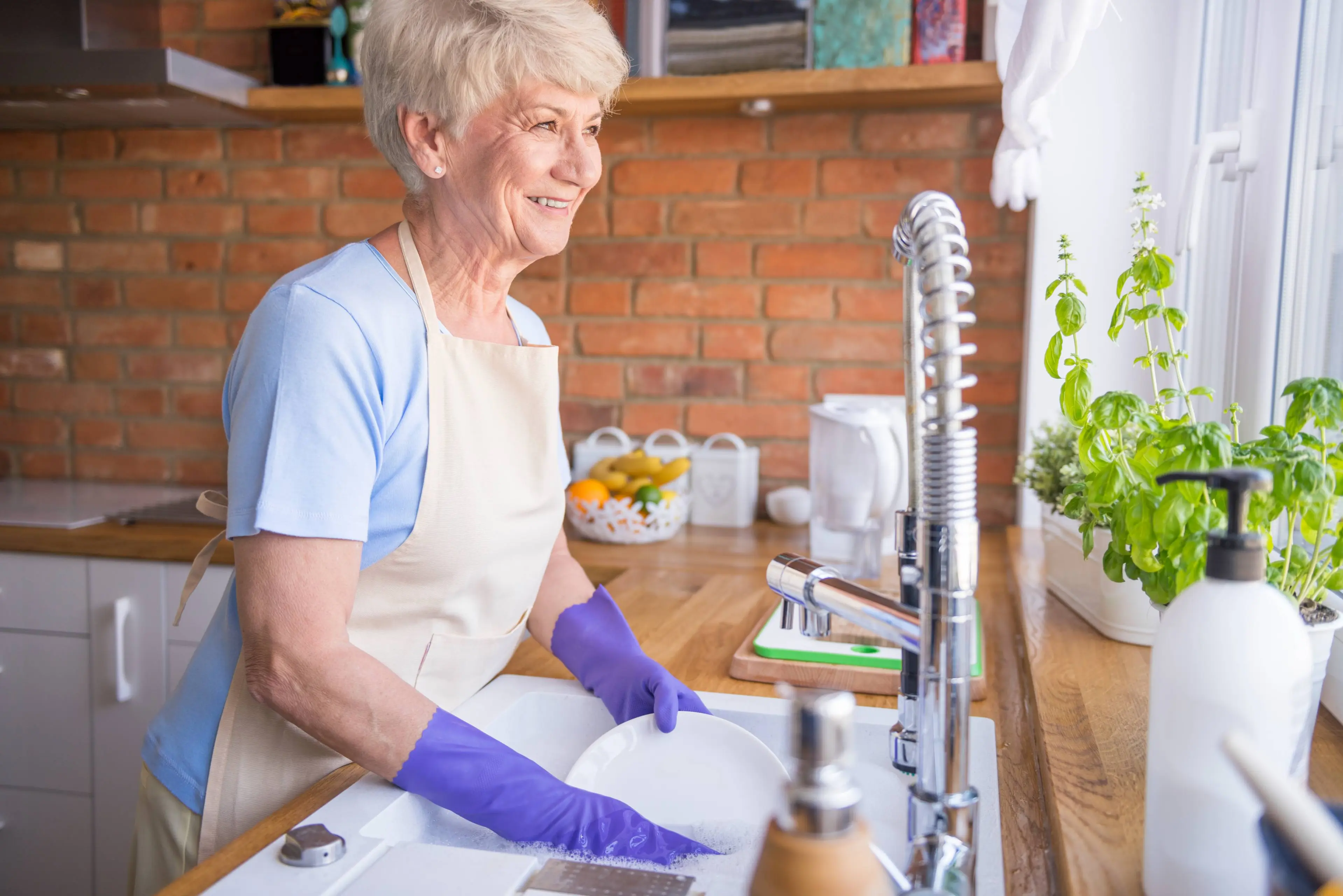 woman-washing-dishes-front-window