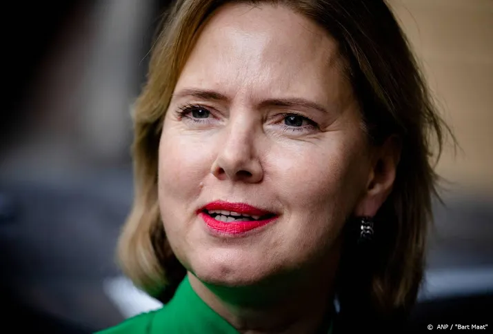 actievoerders blokkeren auto minister