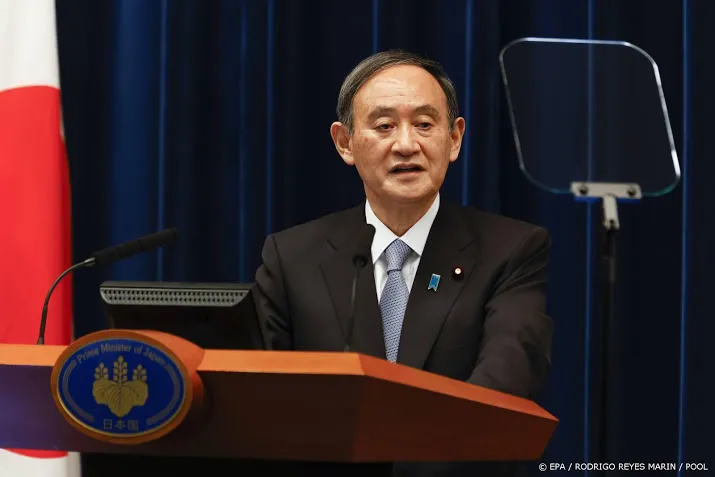 japanse premier spelen het bewijs dat corona is overwonnen