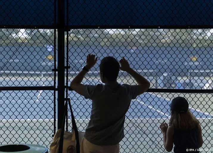 schuurs en middelkoop verliezen in gemengd dubbel op us open