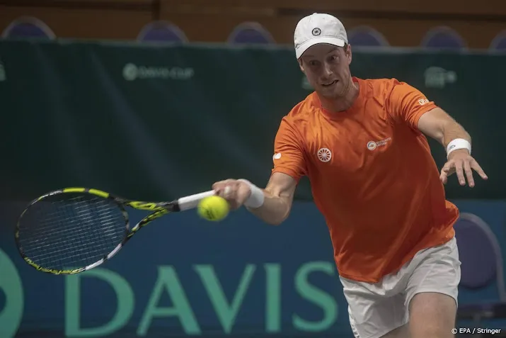 tennisser van de zandschulp en coach groeneveld uit elkaar