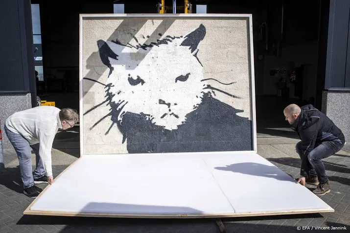 veiling muurschildering banksy uitgesteld na technische problemen