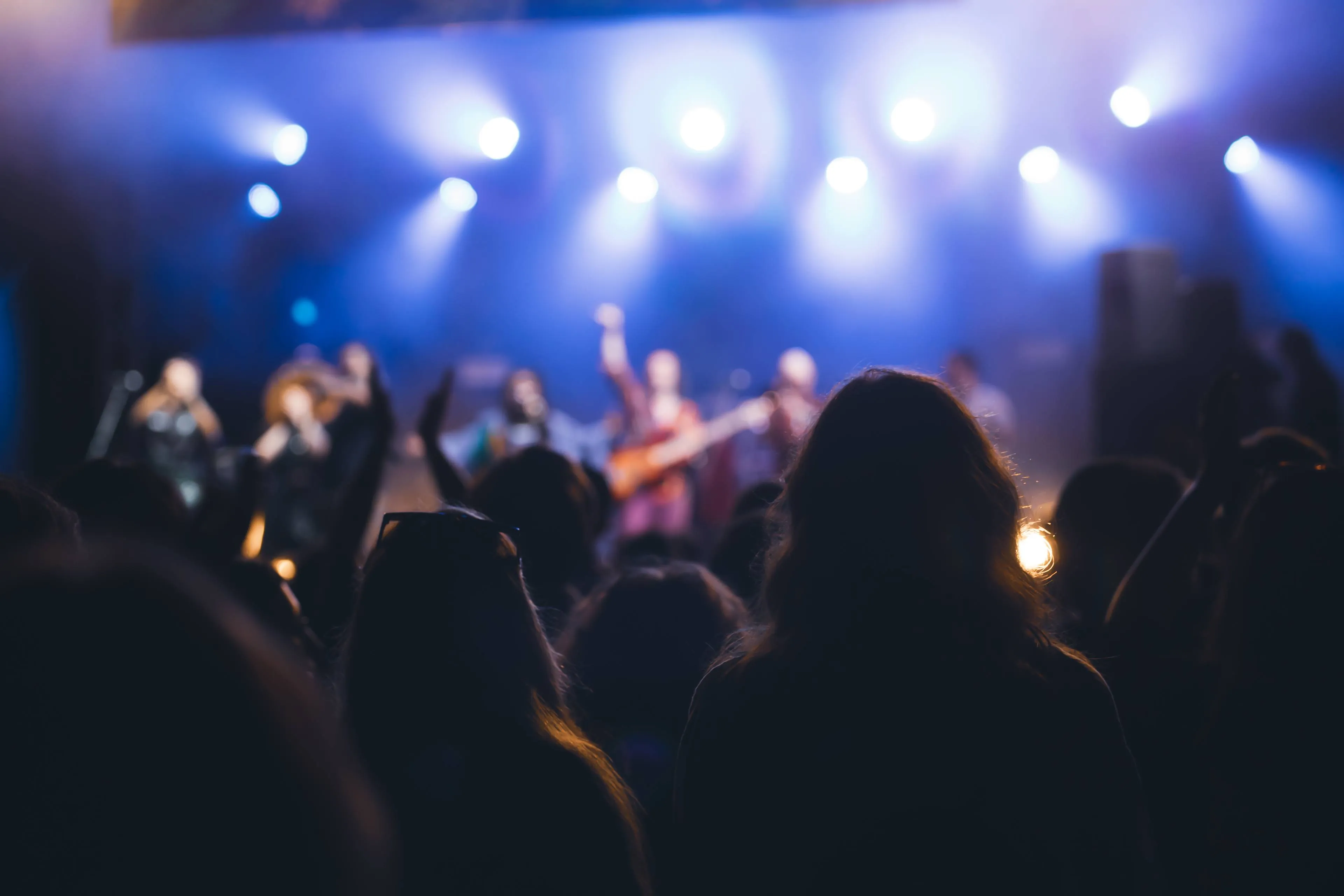 crowd at concert and blurred stage lights 2025 03 27 02 00 34 utc