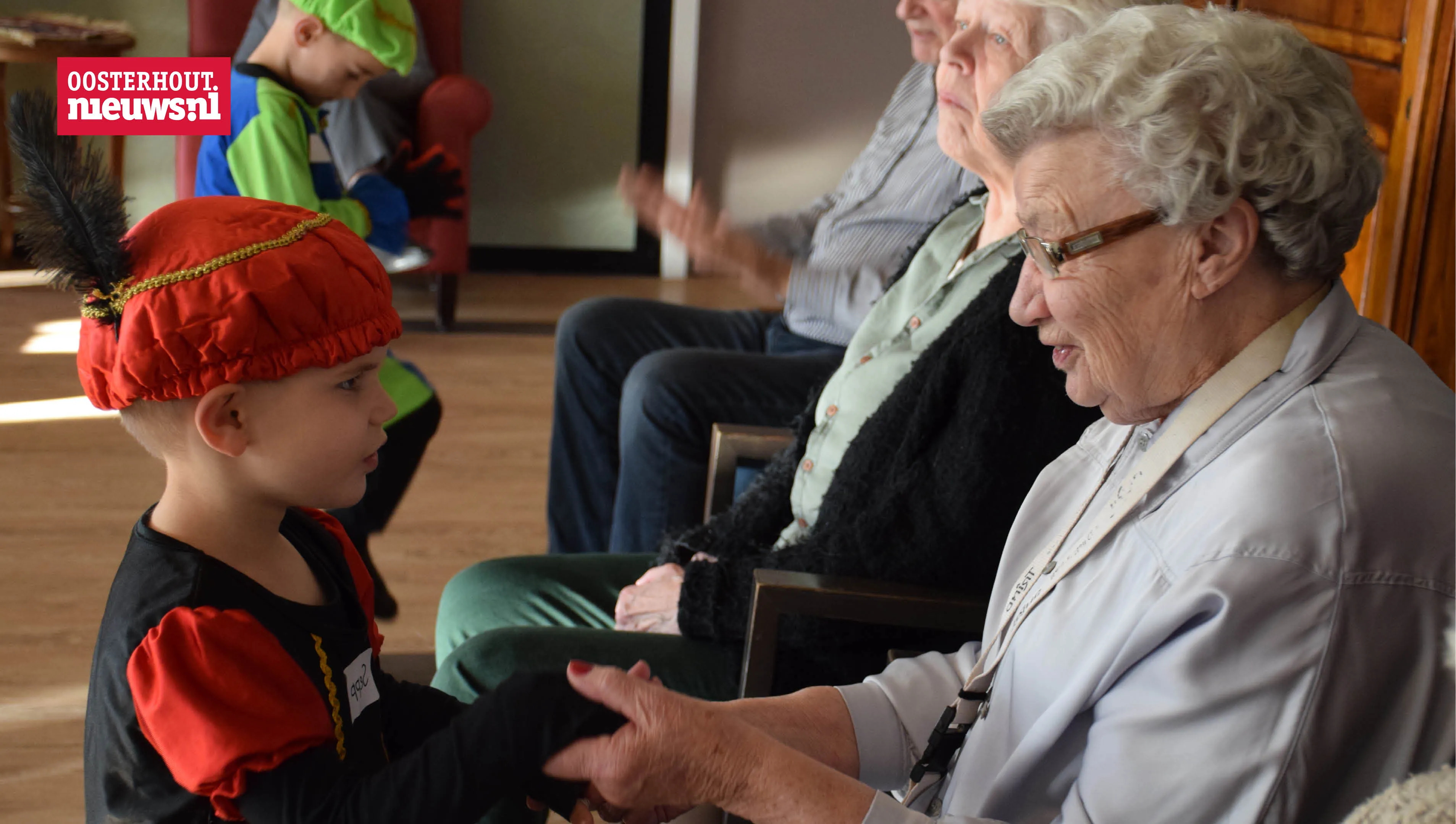 bejaard met kind pietje